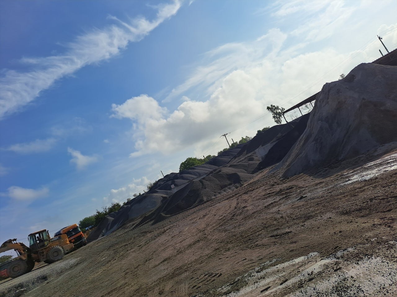 Wheel loader working the aggregate stockpiles at the quarry